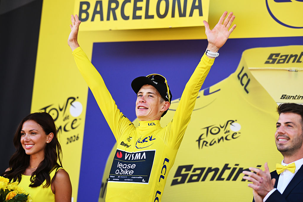 BARCELONA, SPAIN - JULY 04: Jonas Vingegaard of Denmark and Team Visma | Lease a Bike celebrates at podium as Yellow Leader Jersey winner during the 113th Tour de France 2026, Stage 1 a 19.6km team time trial stage from Barcelona to Barcelona / #UCIWT / on July 04, 2026 in Barcelona, Spain. (Photo by Dario Belingheri/Getty Images)