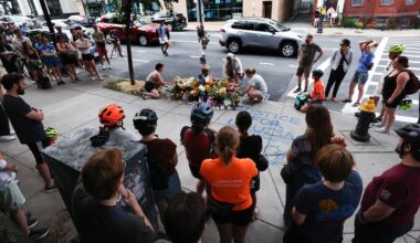 People gathered for a memorial vigil where Boston bike activist Louisa Gag was killed.