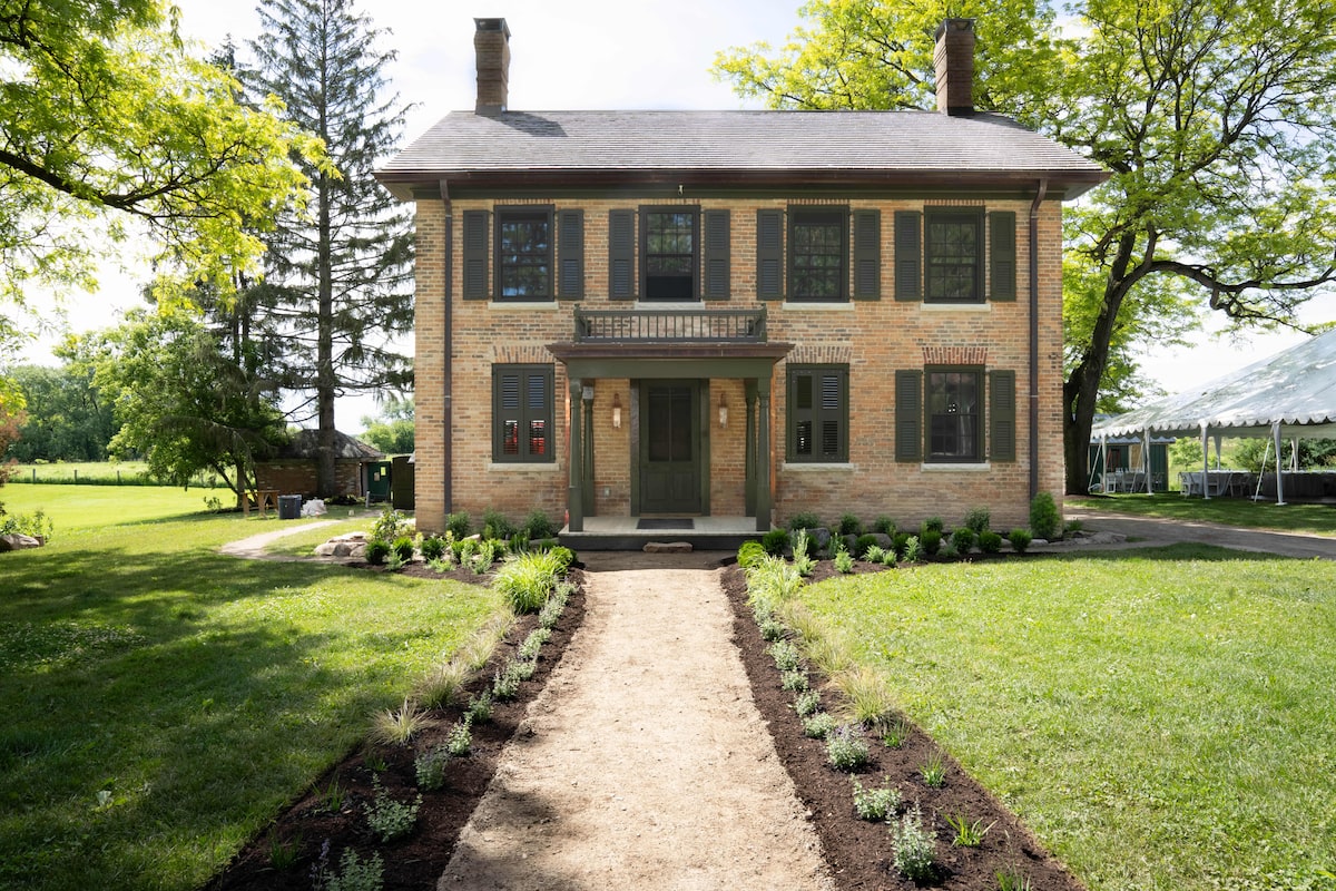 An 1856 Georgian-style home is brought back into the family and restored