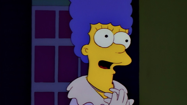 Marge sings onstage in 