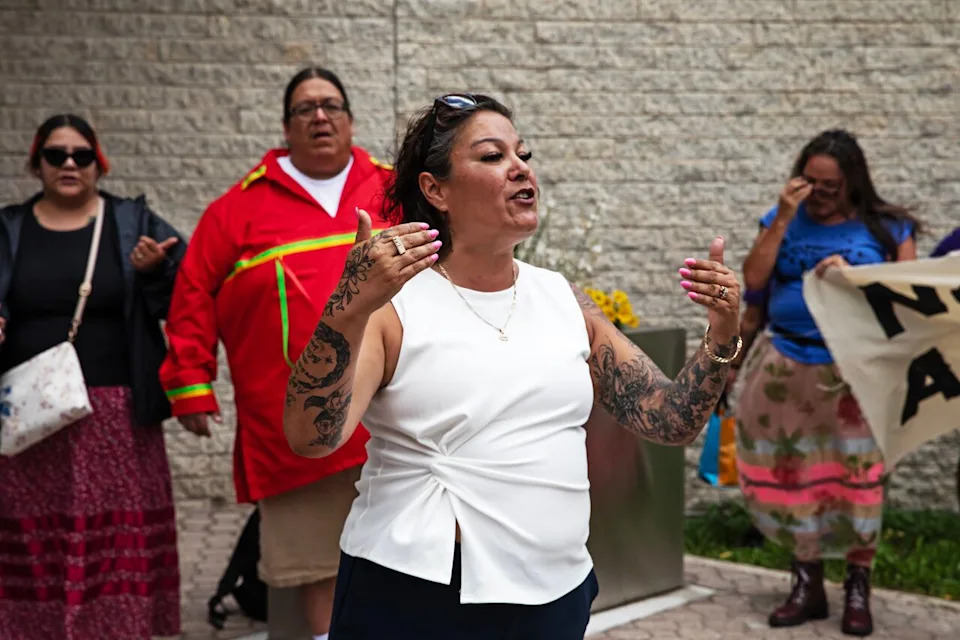 Melissa Robinson, director of the Assembly of Manitoba Chiefs' Missing and Murdered First Nations Peoples Unit, speaks to a crowd at a rally outside the Winnipeg Remand Centre on Monday, July 6, 2026, following the in-custody death of Kiana Everett, 25, on July 1.