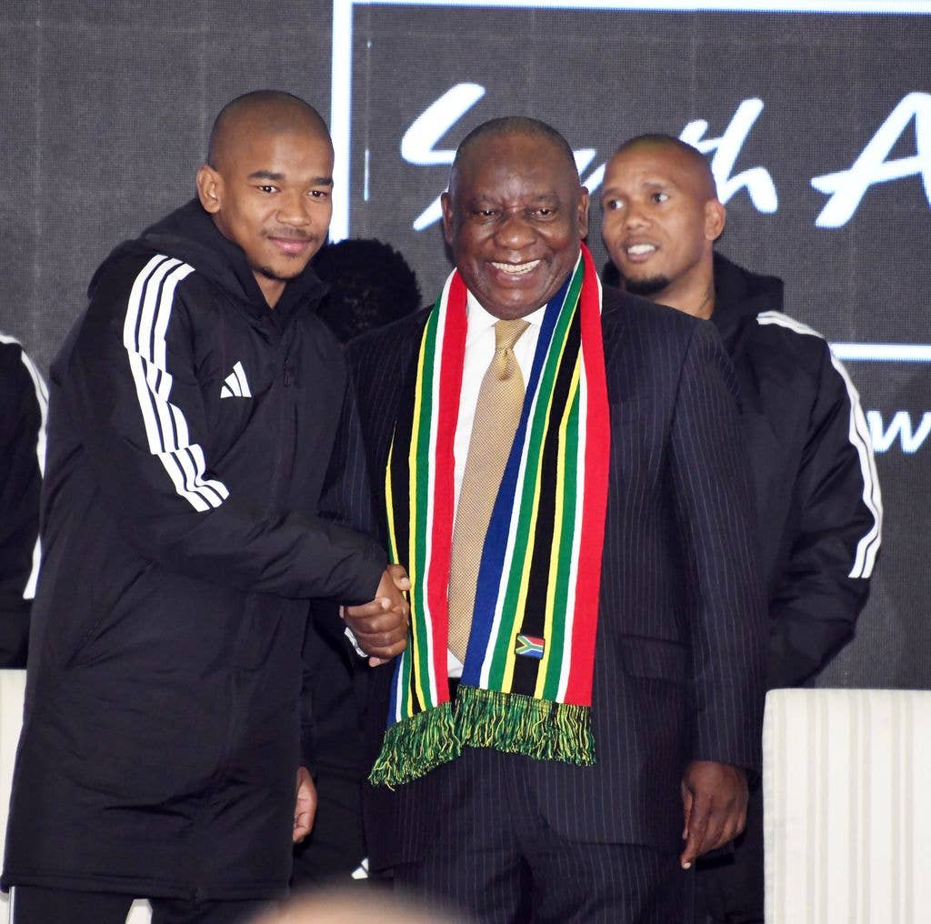 Jayden Adams and President Cyril Ramaphosa during at the Bafana Bafana FIFA World Cup Send-Off Dinner at Sefako M. Makgatho Presidential Guesthouse on May 27, 2026 in Pretoria, South Africa. The send-off dinner serves as a formal farewell to the national squad ahead of their departure to the FIFA World Cup tournament in Mexico, the United States and Canada. (Photo by Frennie Shivambu/Gallo Images via Getty Images)