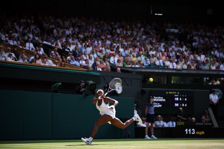 US player Coco Gauff returns to Czech Republic's Karolina Muchova during their women's singles semi-final tennis match on the eleventh day of the 2026 Wimbledon Championships at The All England Lawn Tennis and Croquet Club in Wimbledon, southwest London, on July 9, 2026. (Photo by HENRY NICHOLLS / AFP) / RESTRICTED TO EDITORIAL USE