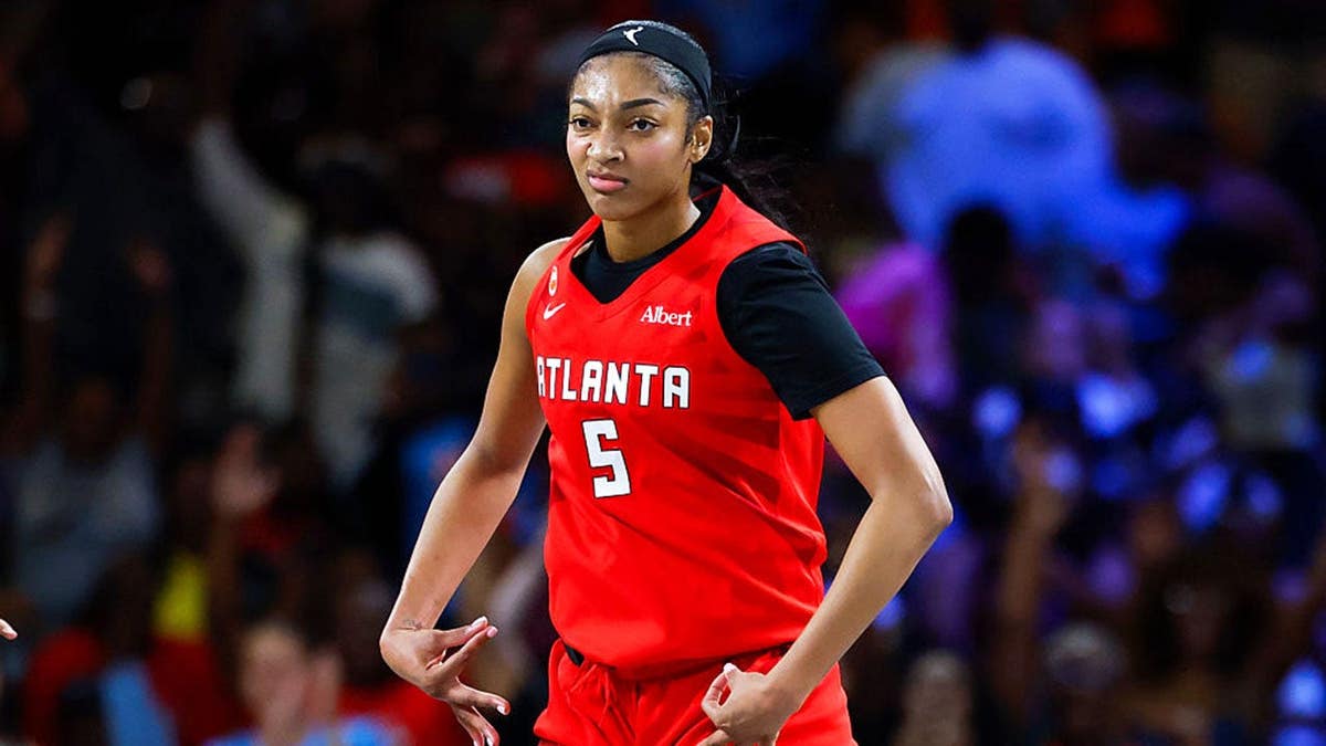 Angel Reese reacts during a game in College Park, Georgia.