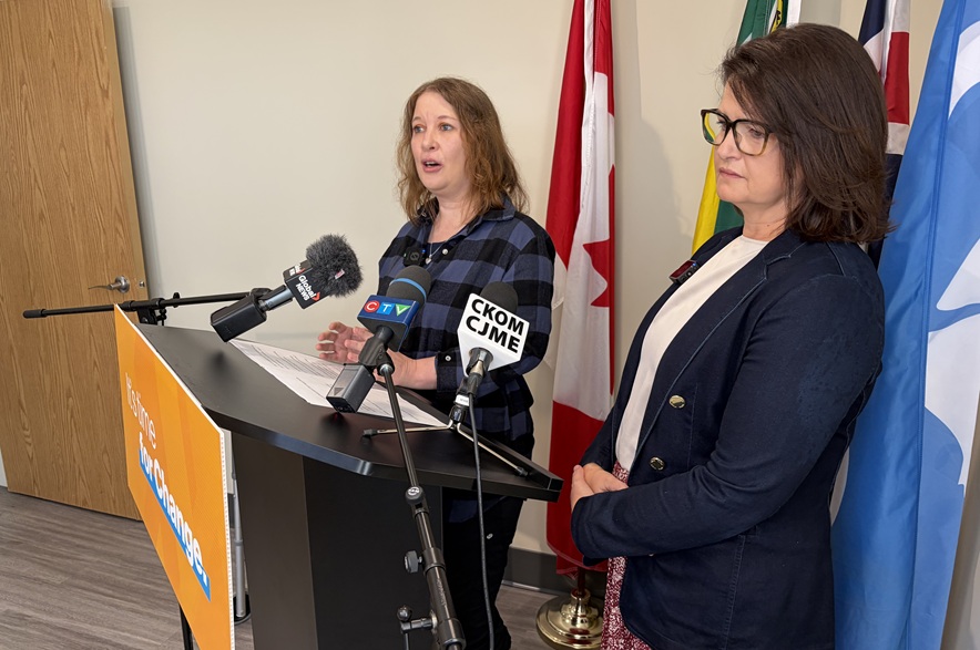 Anne Fournier, standing with Carla Beck to the right, said she reached out to both the provincial government and the NDP about her experience, but only heard back from the latter. (Marija Robinson/650 CKOM)