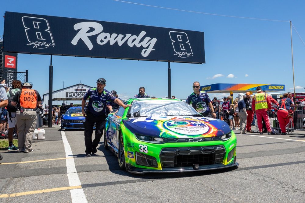 Austin Hill, No. 33 Richard Childress Racing Chevrolet, rolls by Kyle Busch tribute signage 