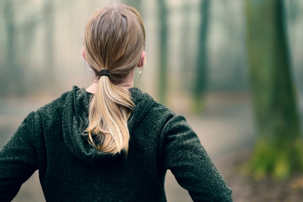 woman taking in the beauty of nature during a walk