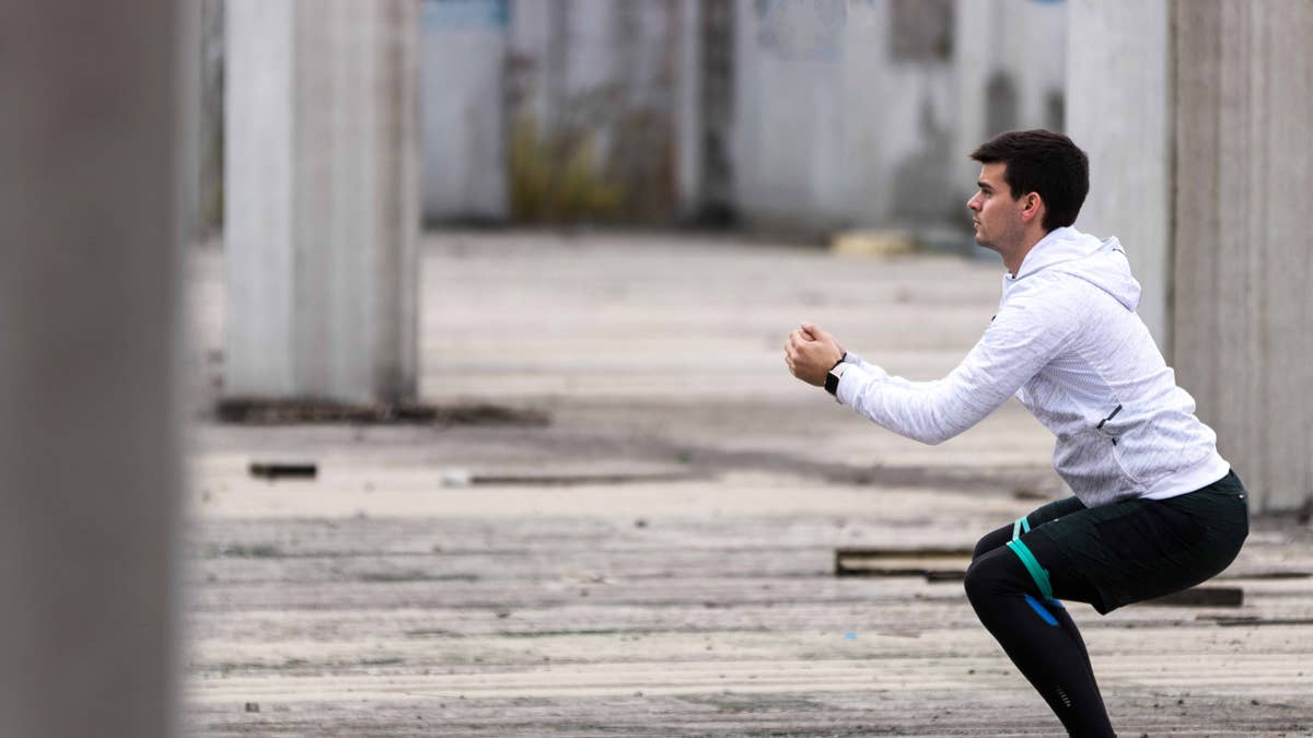 The Simple Resistance Band Exercise Trainers Recommend to Undo the Damage of Sitting All Day