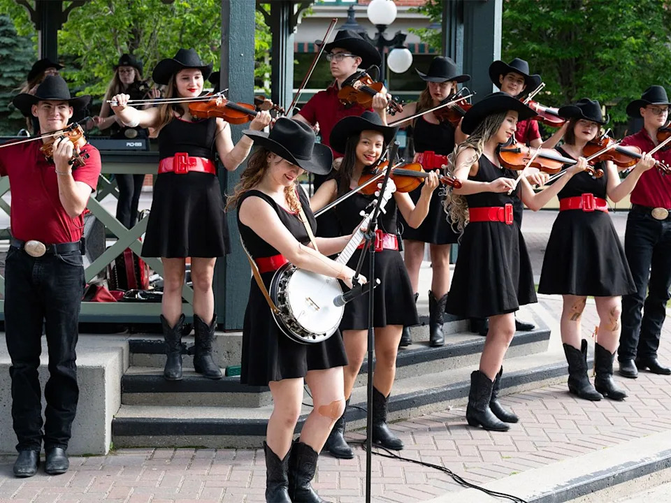 The Calgary Fiddlers perform at the Legacy Stampede Breakfast at Heritage Park in Calgary on Sunday, July 5, 2026.