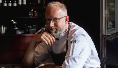 Who is the chef behind Bacchus restaurant in Vancouver?