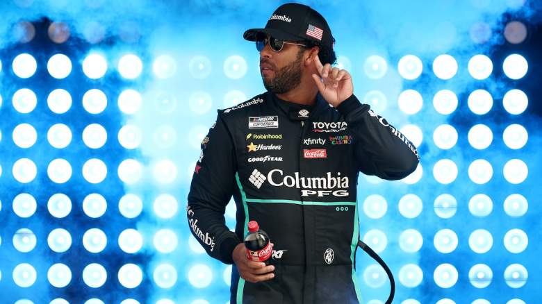 Bubba Wallace, driver of the #23 Columbia PFG/Academy Sports Toyota, walks onstage.