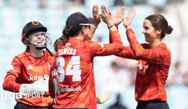Charli Knott (right) is congratulated by Blaze team-mate Georgia Elwiss (wearing the number 34) after taking a wicket against Surrey in the Vitality Women's Blast semi-final at The Oval on Friday 17 July, 2026