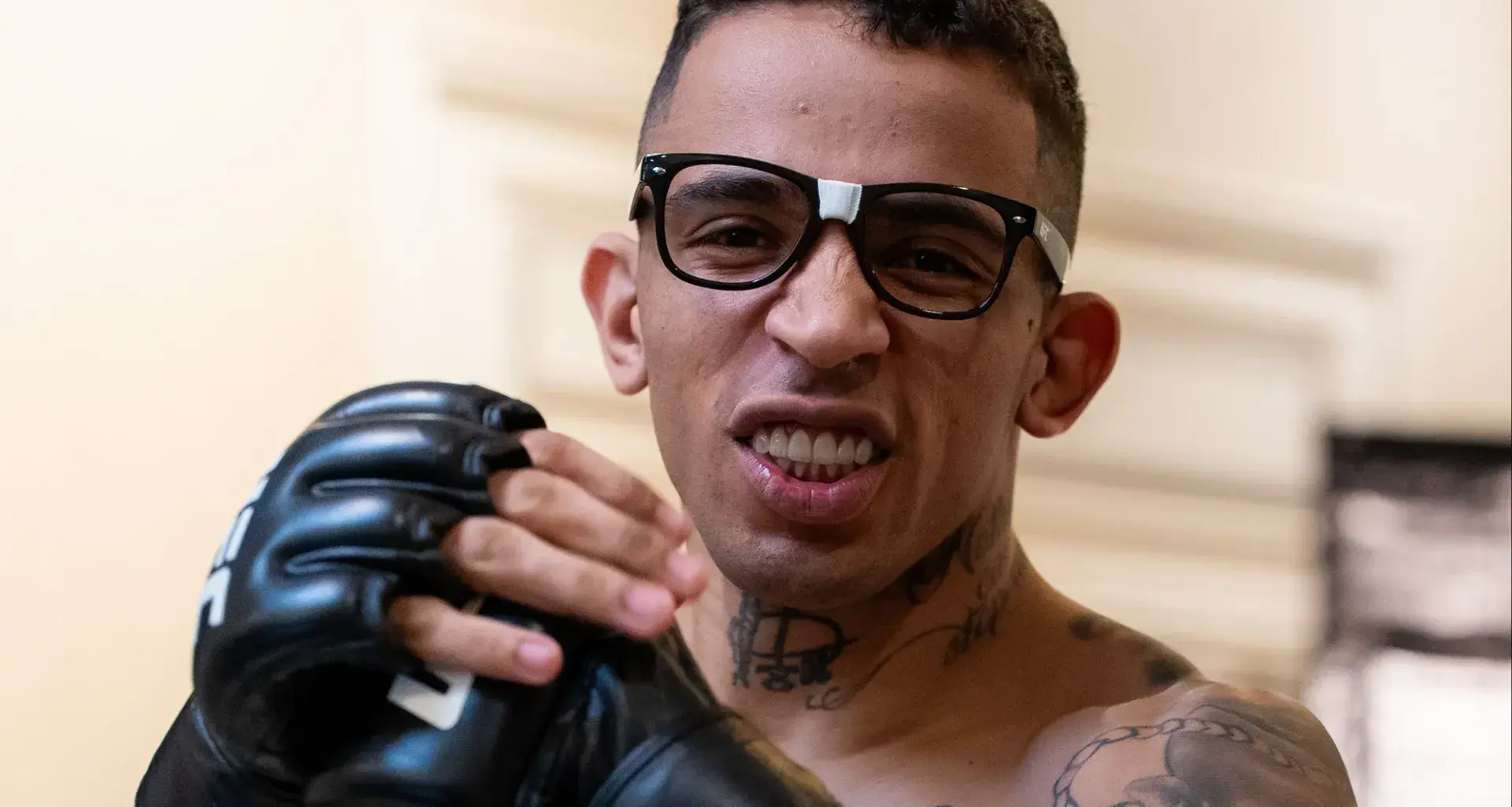 Undefeated MMA fighter Elbek Alyshov celebrates his victory