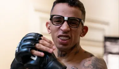Undefeated MMA fighter Elbek Alyshov celebrates his victory