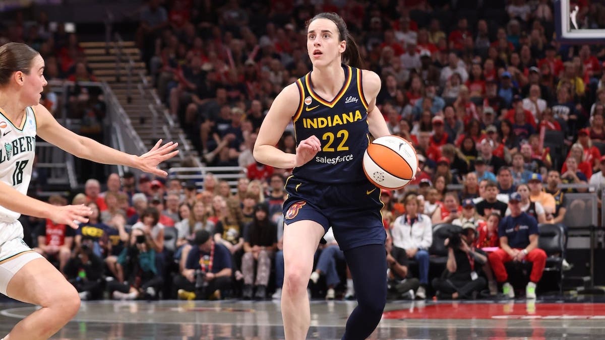Caitlin Clark dribbles the ball during a game in Indianapolis.