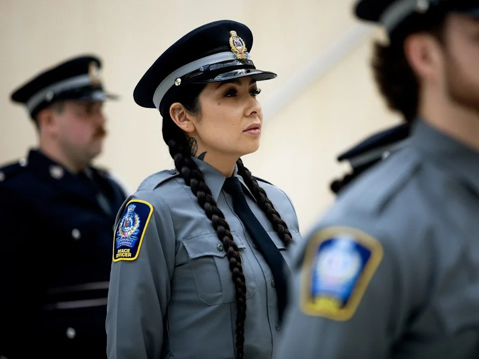  Mariah Eshkakogan and members of the Community Peace Officer Class 26-01 graduate from Alberta’s Community Peace Officer Induction Program during a ceremony at Edmonton City Hall, Tuesday June 30, 2026.