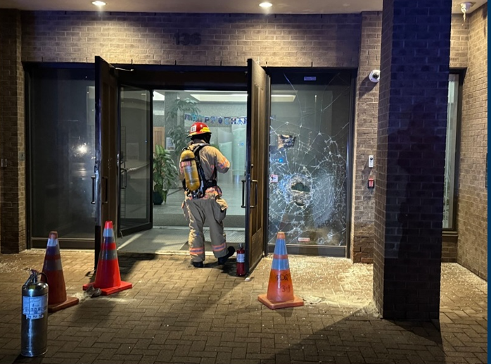 A firefighter on the scene after a firebomb was thrown at Congregation Beth Tikvah, Montreal, Dec. 18, 2024. (Credit: Centre for Israel and Jewish Affairs)