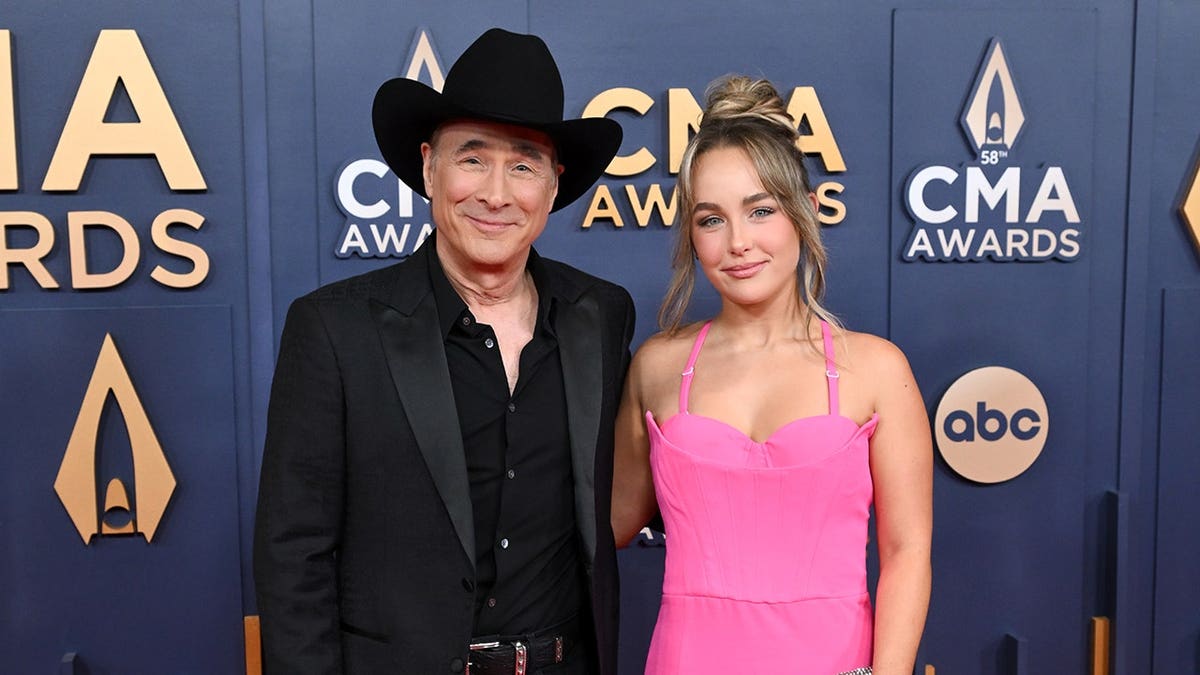 Clint Black and Lily Pearl Black at the CMA Awards.
