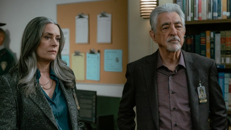 Emily Prentiss and David Rossi standing side by side in the B.A.U. in Criminal Minds Season 19