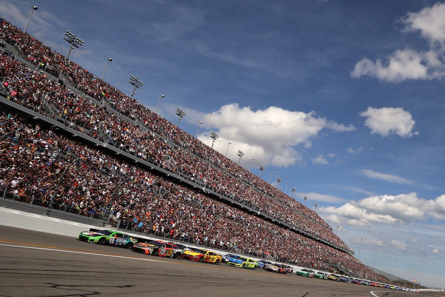 Kyle Busch, driver of the #8 zone Jalapeno Lime Chevrolet, and Chase Briscoe, driver of the #19 Bass Pro Shops Toyota, lead the field to start the NASCAR Cup Series Daytona 500 at Daytona International Speedway on February 15, 2026 in Daytona Beach, Florida. (Photo by Chris Graythen/Getty Images)
