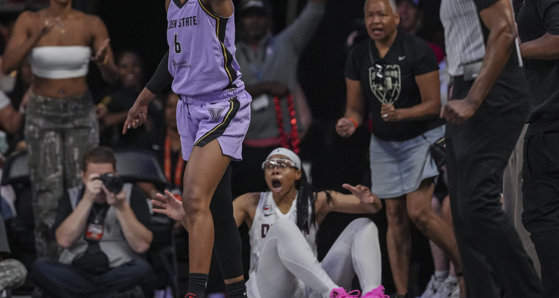 Allisha Gray reacts to a call