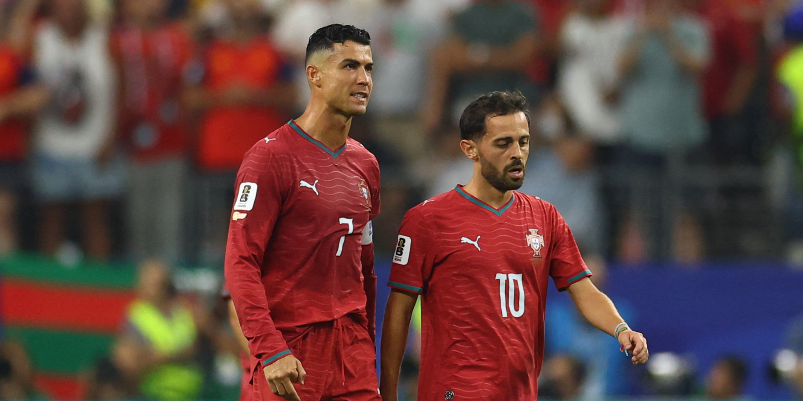 Bernardo Silva and Cristiano Ronaldo after Portugal concede vs Spain
