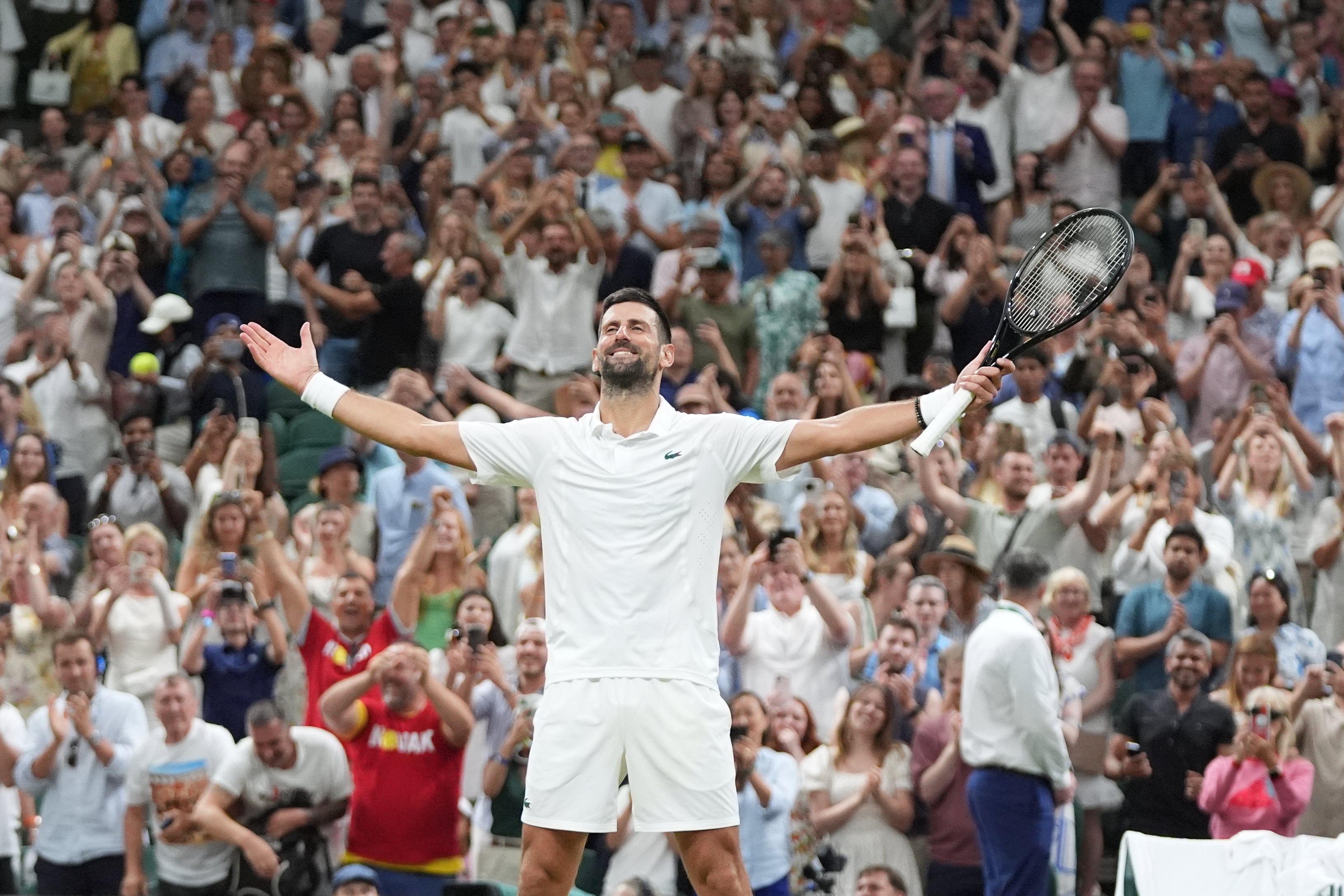 Djokovic soaks in the applause of Centre Court after an astonishing win over Auger-Aliassime in five hours and 15 minutes