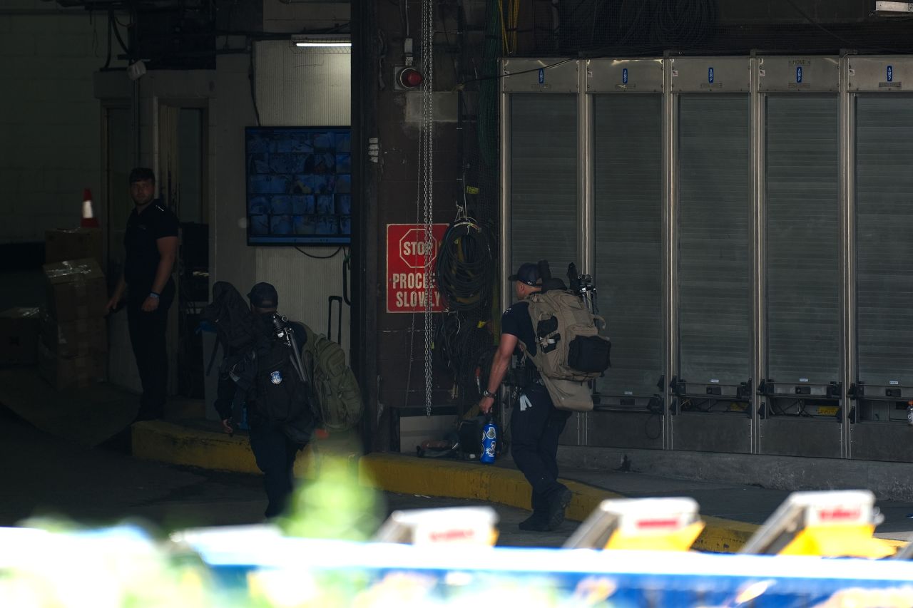 NYPD officers enter Madison Square Garden.