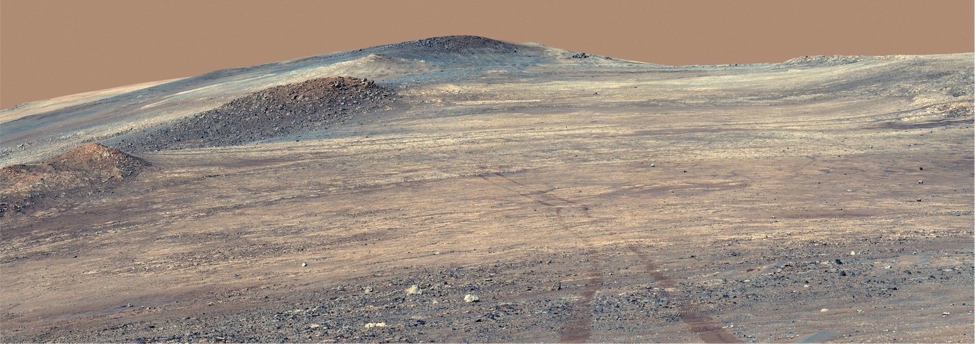 NASA’s Perseverance rover captured its own tracks descending from the rim of Jezero Crater. Credit: NASA/JPL-Caltech/ASU/MSSS