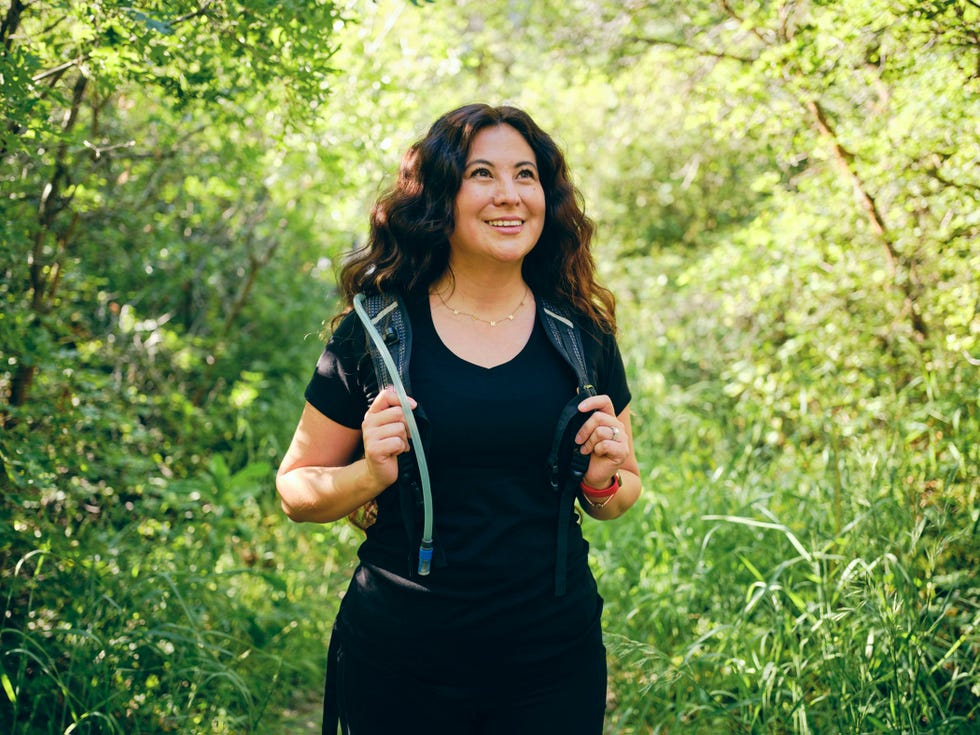 Woman Enjoying an Active Lifestyle a woman enjoying active lifestyle time outdoors in a nature environment.