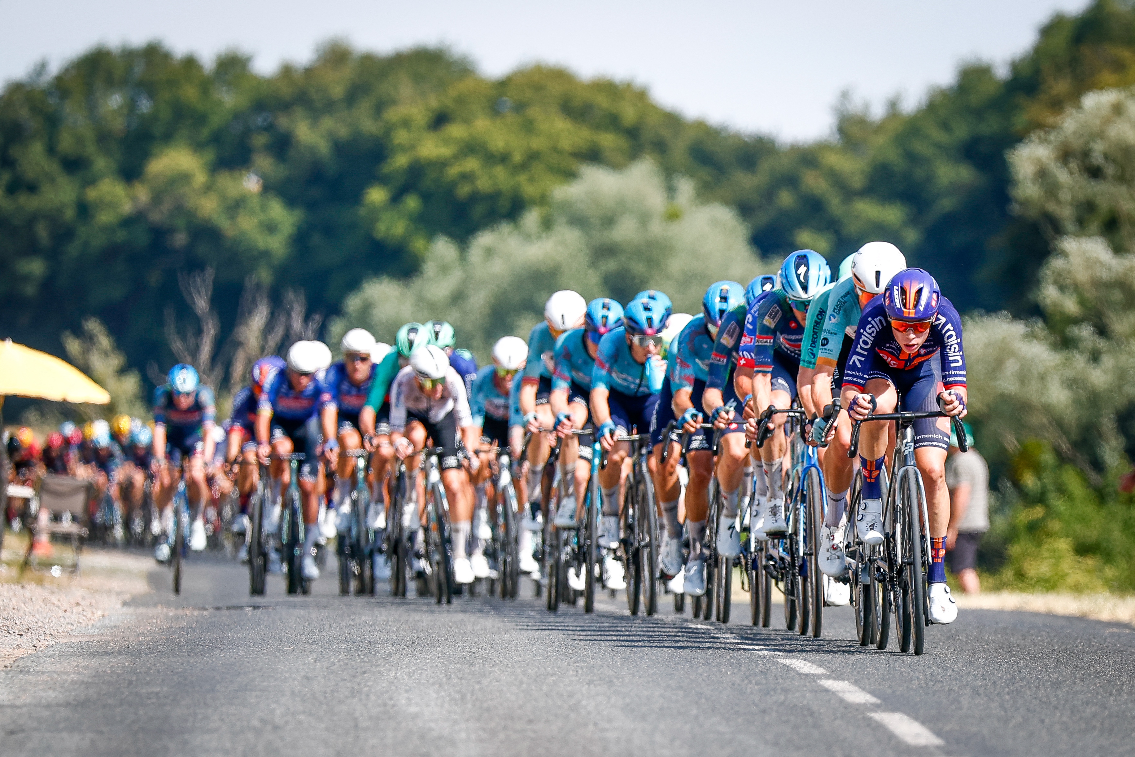 The pack of riders pictured in action during the stage 11 of the 2026 Tour de France cycling race, a stage of 161km from Vichy to Nevers, on Wednesday 15 July 2026. The 113th edition of the Tour de France starts on Saturday 4 July in Barcelona, Spain, and will finish in Paris, France on the 26th of July. BELGA PHOTO POOL LUCA BETTINI (Photo by POOL LUCA BETTINI / BELGA MAG / Belga via AFP)