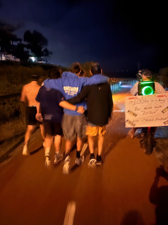 Sixteen-year-old Austin Wyeth during his 100km run, being supported by friends and family. 