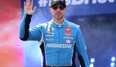 An image of NASCAR driver Denny Hamlin waving