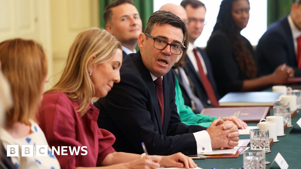 Burnham tells cabinet to tackle living costs at first meeting - BBC