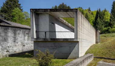 three alpine cemeteries emerge between stone walls and mountain horizons