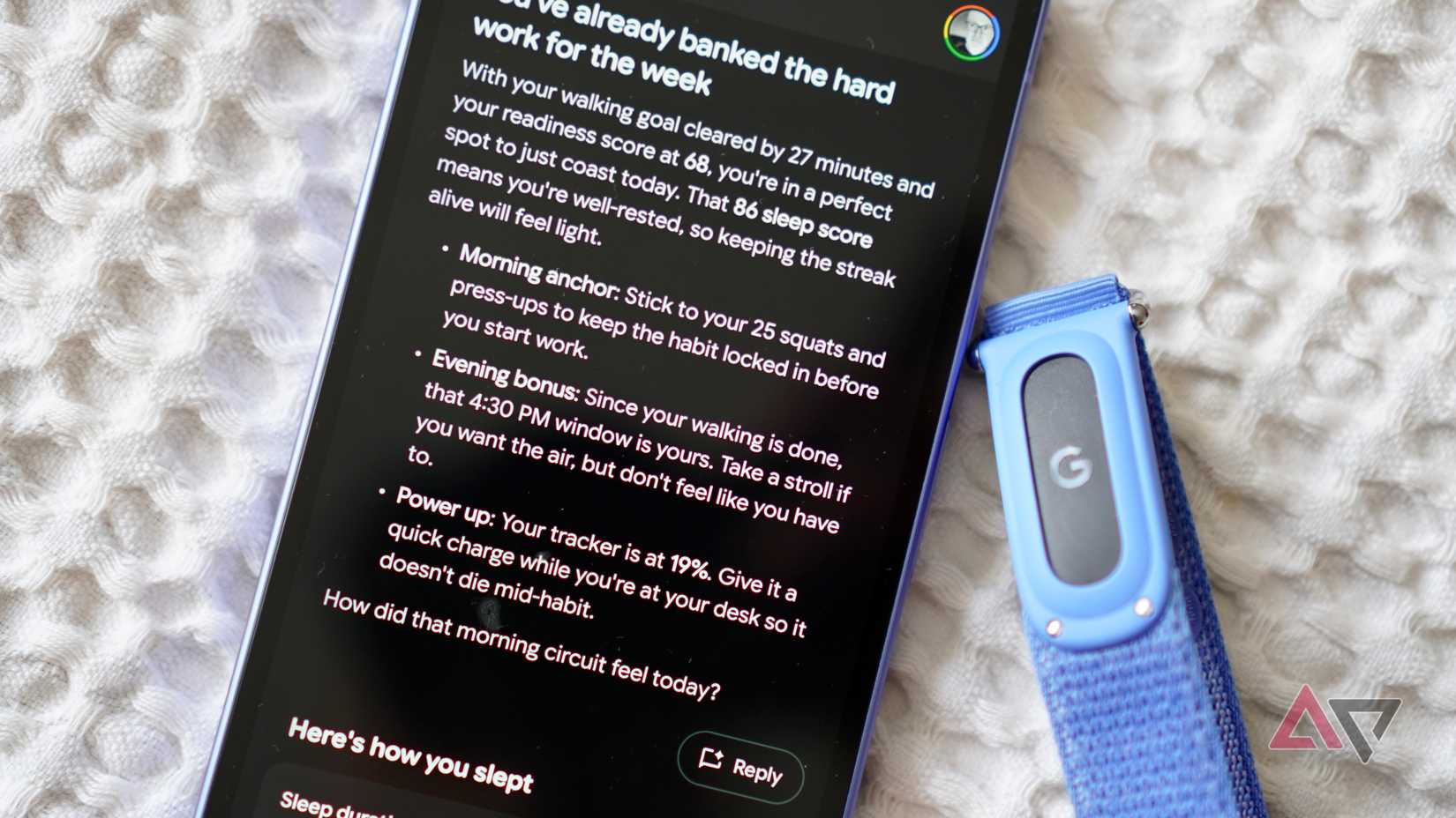 The Fitbit Air with the Google Health app on a Pixel 10a