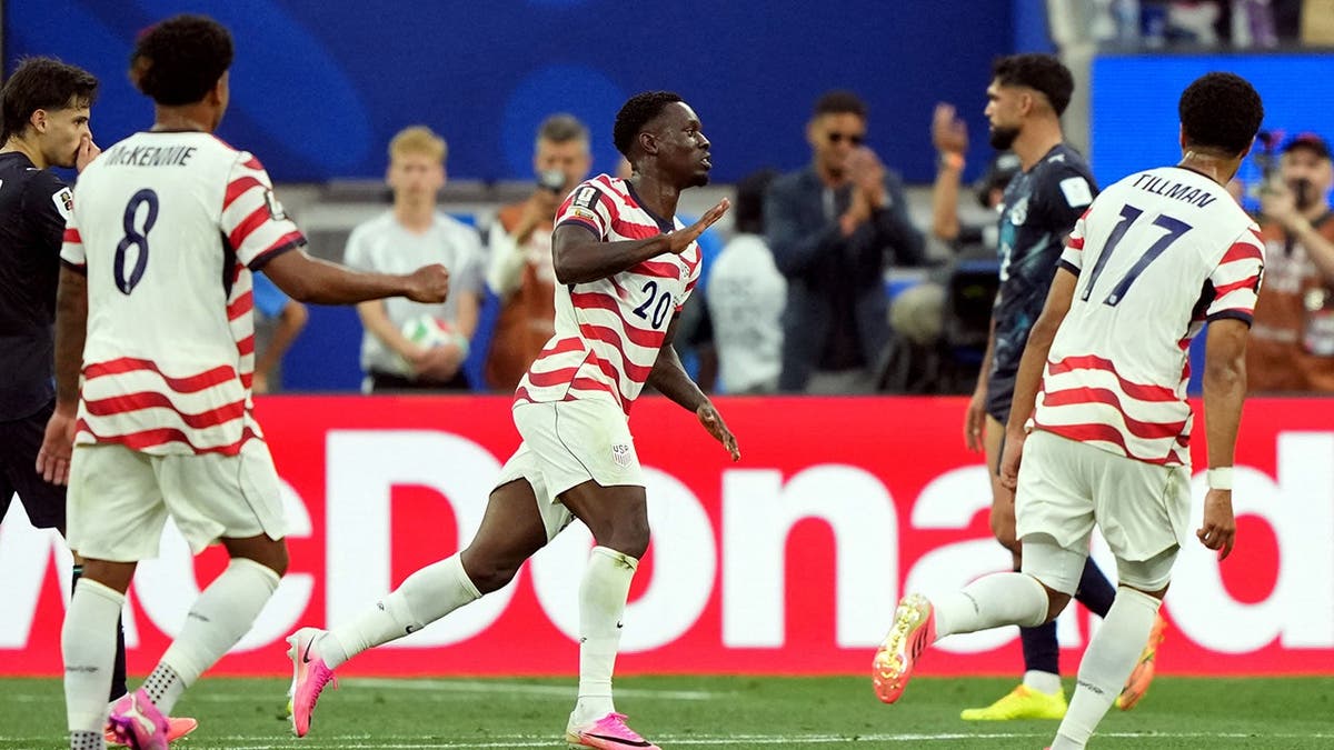 Folarin Balogun celebrates