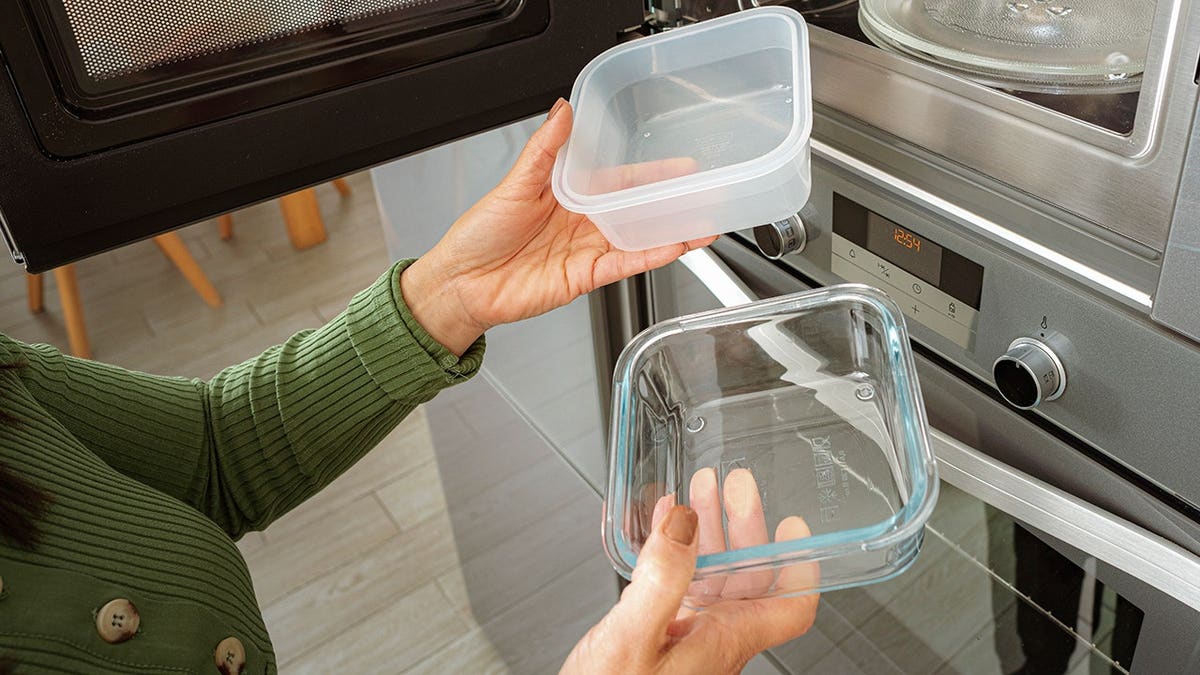 Plastic and glass containers positioned near a microwave oven.