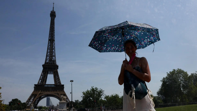 Degrees of denial: Paris blames US for climate change in heated exchange