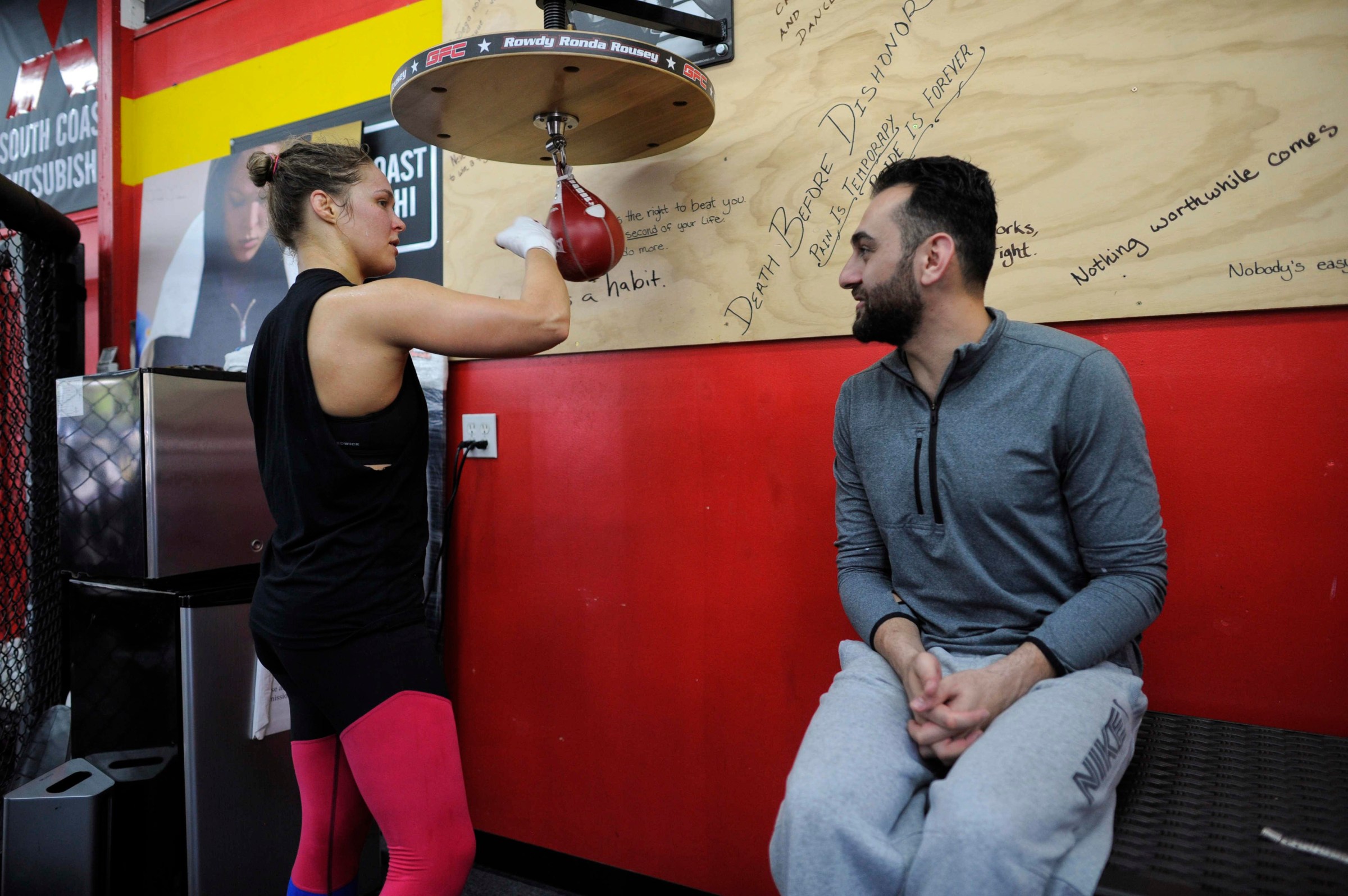 GLENDALE, CA - October 17: UFC women’s bantamweight champion Ronda Rousey works on the speed bag as coach Edmond Tarverdyan watches at the Glendale Fighting Club in Glendale,CA, Friday, October 17, 2015. Rousey will face Holly Holm during UFC 193, November 15, 2015 at Etihad Stadium in Melbourne, Australia. (Photo by Hans Gutknecht/MediaNews Group/Los Angeles Daily News via Getty Images)