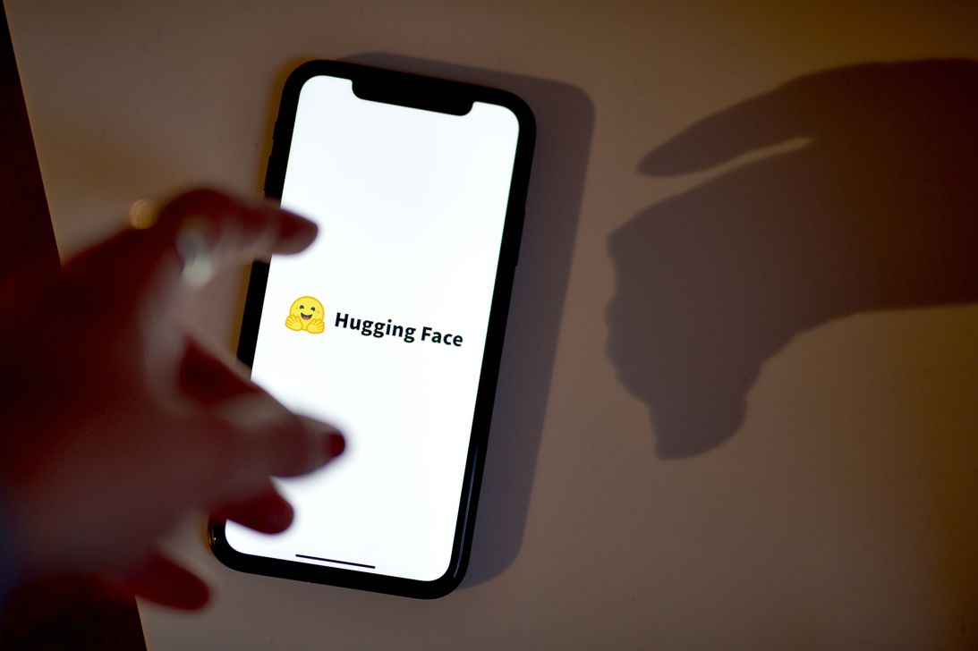 The Hugging Face logo on a smartphone on August 17, 2023.