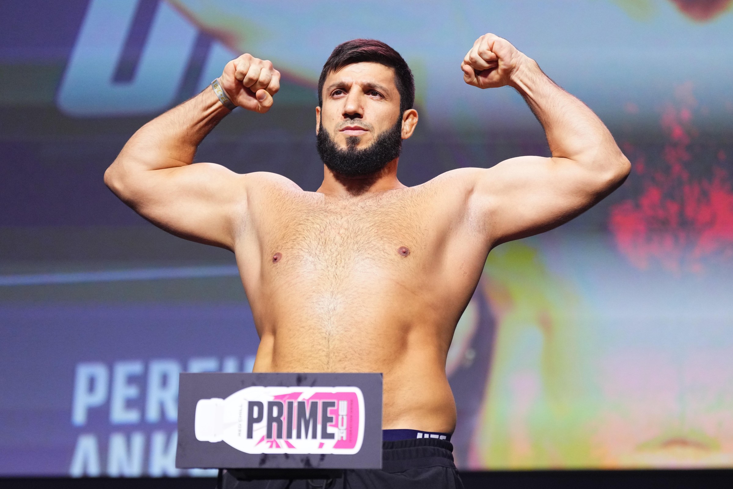 LAS VEGAS, NEVADA - MARCH 07: Rizvan Kuniev of Russia poses on the scale during the UFC 313 ceremonial weigh-in at Michelob ULTRA Arena on March 07, 2025 in Las Vegas, Nevada. (Photo by Jeff Bottari/Zuffa LLC)