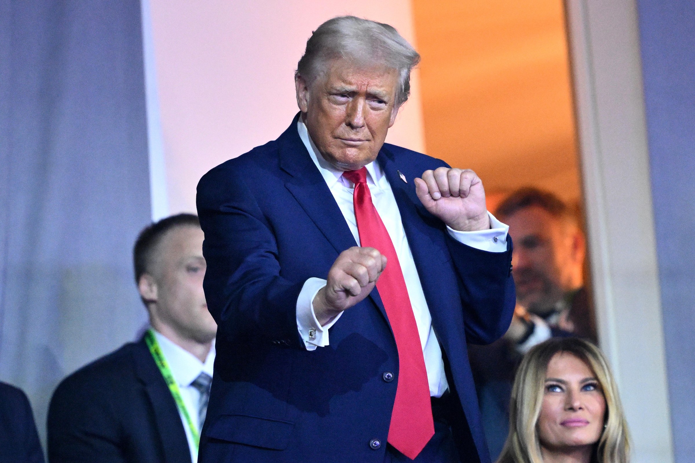 WASHINGTON, DC - DECEMBER 05: U.S. President Donald Trump dances to the final performance of the Village People during the FIFA World Cup 2026 Official Draw at John F. Kennedy Center for the Performing Arts on December 05, 2025 in Washington, DC. (Photo by Mandel NGAN - Pool/Getty Images)