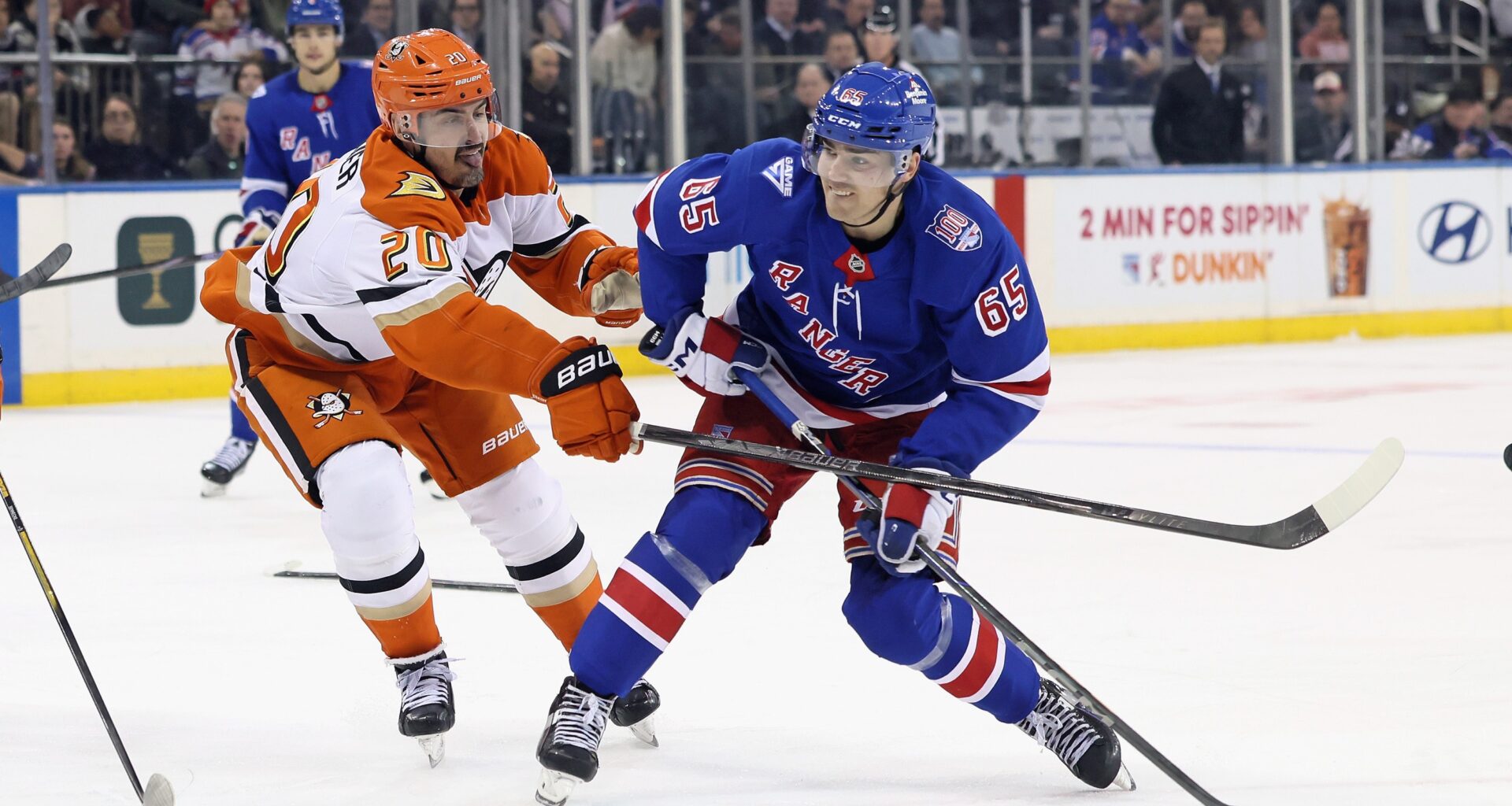 Chris Kreider #20 of the Anaheim Ducks checks Brett Berard #65 of the New York Rangers