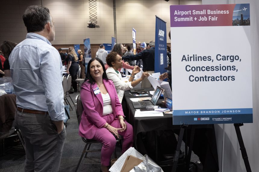 Job seekers attend a small-business summit and job fair hosted by the Chicago Department of Aviation on May 12, 2026, in Chicago.