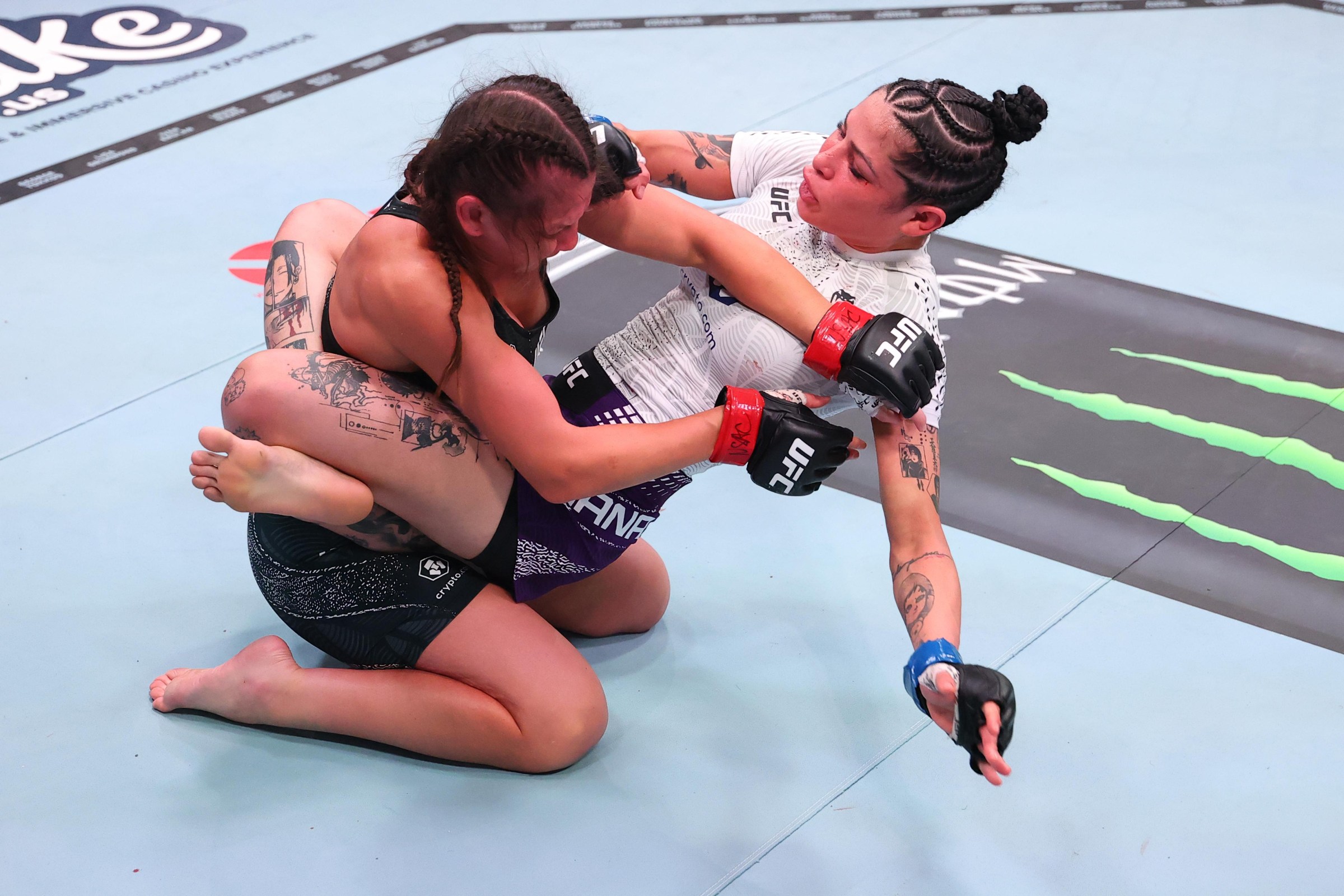 LAS VEGAS, NEVADA - MAY 16: (R-L) Polyana Viana of Brazil battles Alice Ardelean of Romania in a strawweight fight during the UFC Fight Night event at Meta APEX on May 16, 2026 in Las Vegas, Nevada. (Photo by Ed Mulholland/Zuffa LLC)