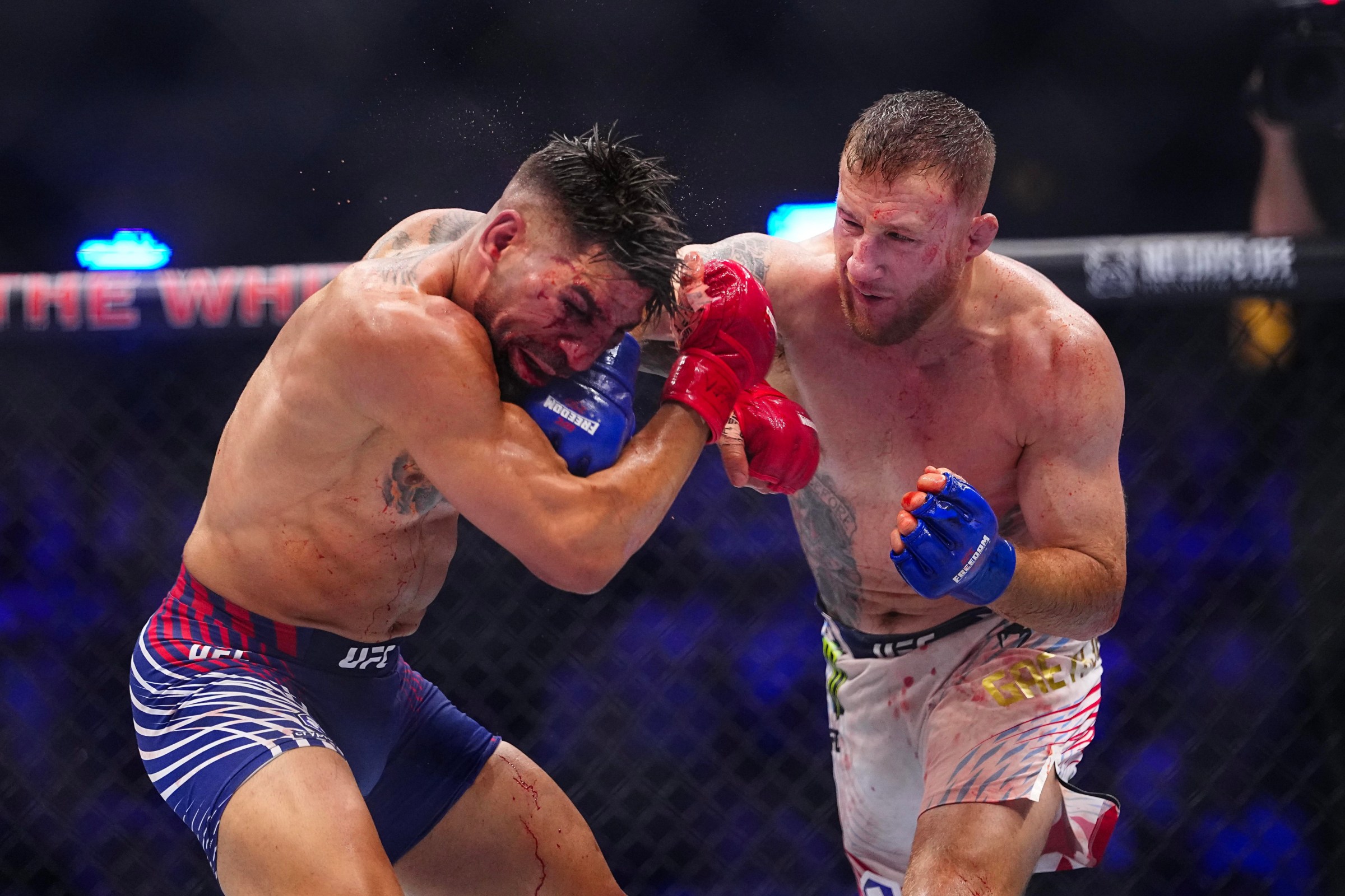 WASHINGTON, DC - JUNE 14: Justin Gaethje strikes Ilia Topuria of Spain in the UFC lightweight championship fight during the UFC Freedom 250 event on the South Lawn at the White House on June 14, 2026 in Washington, DC. (Photo by Chris Unger/Zuffa LLC)