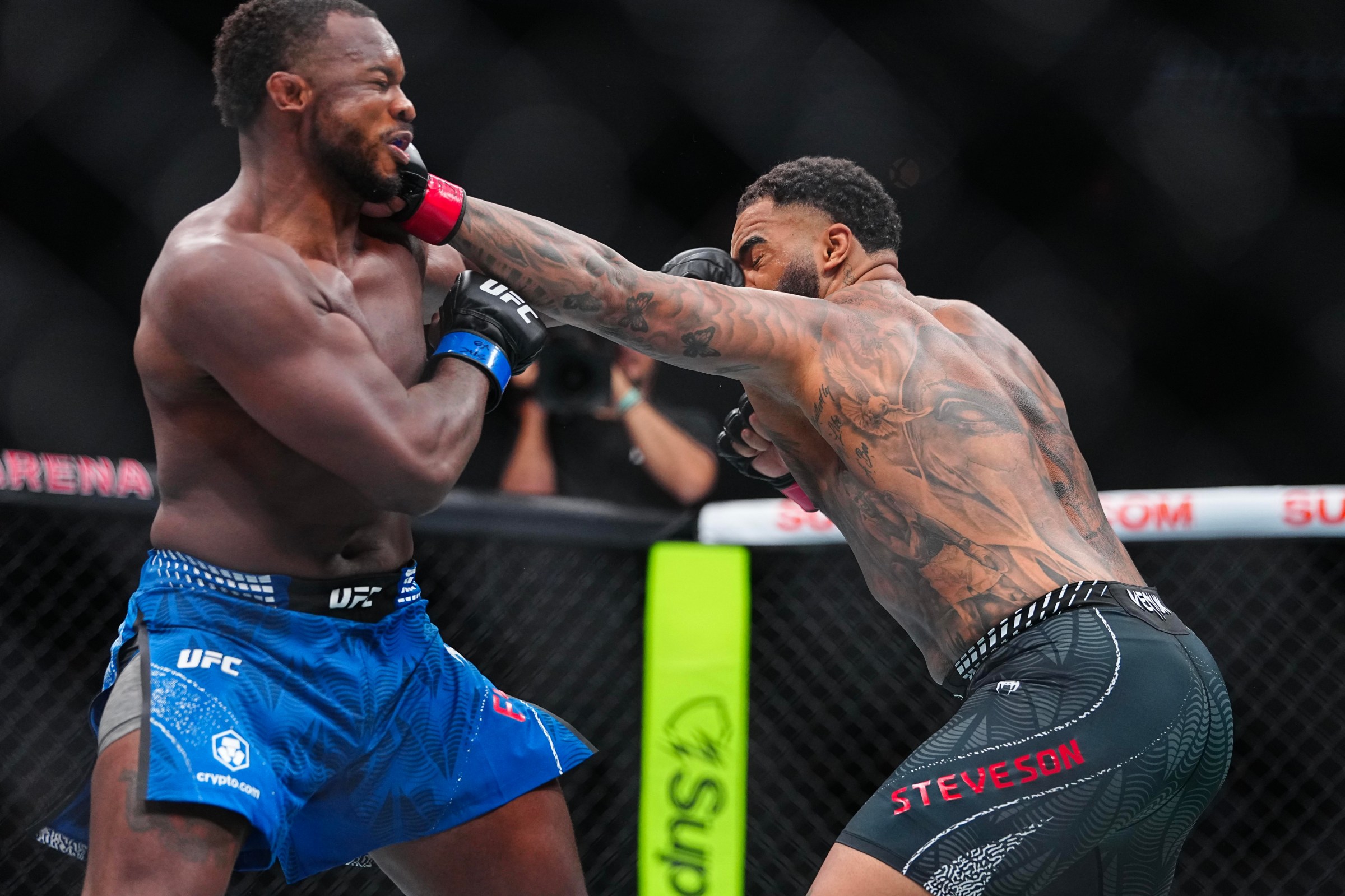 LAS VEGAS, NEVADA - JULY 11: (R-L) Gable Steveson strikes Elisha Ellison in a heavyweight fight during the UFC 329 event at T-Mobile Arena on July 11, 2026 in Las Vegas, Nevada. (Photo by Chris Unger/Zuffa LLC)