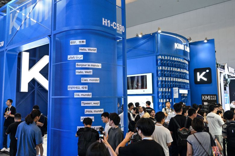 People visit the Moonshot AI stand during the World Artificial Intelligence Conference in Shanghai, July 18, 2026.