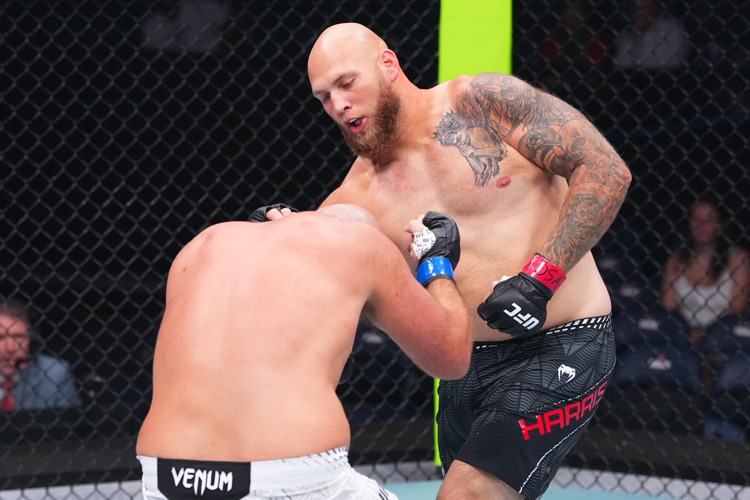 OKLAHOMA CITY, OKLAHOMA - JULY 18: RJ Harris punches Alvin Hines in a heavyweight fight during the UFC Fight Night event at Paycom Center on July 18, 2026 in Oklahoma City, Oklahoma. (Photo by Jeff Bottari/Zuffa LLC)